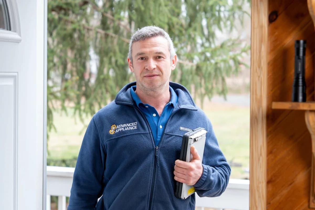 Advanced Appliance technician providing doorstep service